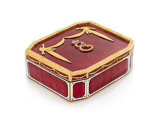 A Continental Gilt Metal and Enamel Table Casket, 20th Century, the case with applied paste stones and centered by a monogram.
