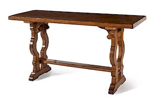 An Italian Renaissance Style Trestle Table Height 31 1/2 x width 60 x depth 22 inches.