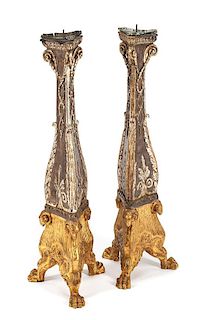 A Pair of Italian Silvered and Giltwood Prickets Height 31 inches.