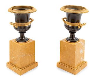 A Pair of Gilt, Patinated Bronze and Marble Campagna Urn Ornaments Height 11 1/2 x diameter 5 1/2 inches.