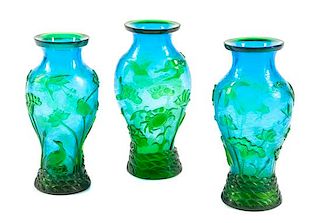 A Peking Glass Three-Piece Garniture Height of tallest 10 inches.