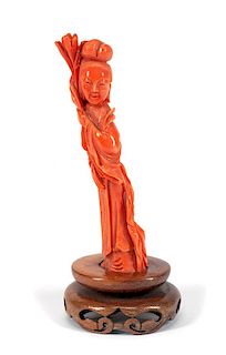 A Chinese Carved Coral Figure of a Lady Height 4 1/2 inches.