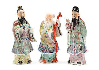 Three Chinese Enameled Porcelain Figures Height of tallest 9 1/2 inches.