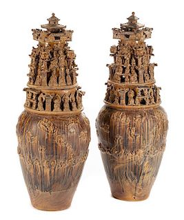 A Pair of Chinese Terra Cotta Covered Urns Height 44 inches.