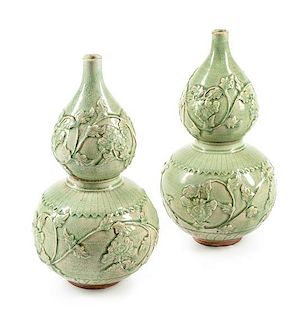 A Pair of Chinese Celadon Glazed Porcelain Vases Height 18 1/2 inches.