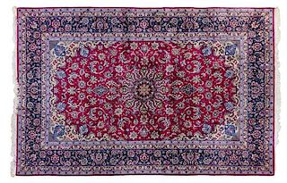 An Isfahan Wool and Silk Rug 10 feet x 6 feet 8 inches.