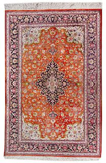 A Persian Silk and Wool Rug 4 feet 10 inches x 3 feet 4 inches.