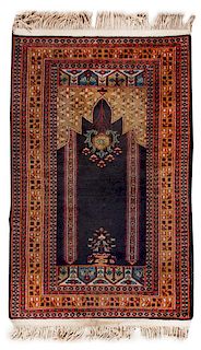 A Persian Wool Prayer Rug 3 feet 9 1/2 inches x 2 feet 5 inches.