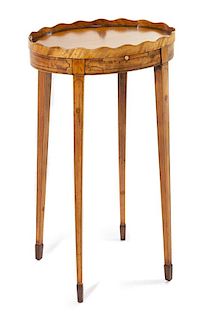 A George III Satinwood Kettle Stand Height 25 1/2 x width 15 1/2 x depth 11 1/2 inches.