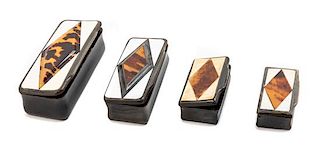 Four Carved Horn and Tortoise Shell Inlaid Snuff Boxes Width of largest 3 3/4 inches.
