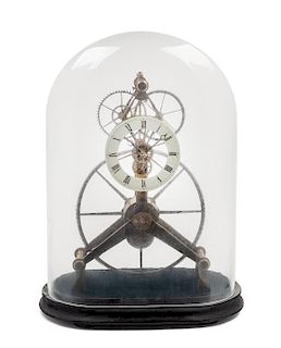 * A Victorian Brass Skeleton Clock Height 19 x width 11 1/2 x depth 6 inches.
