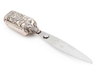 * A Mexican Silver Paper Knife, Margot van Voorhies Carr, Taxco, Mid-20th Century, the handle worked with an Aztec deity, the re