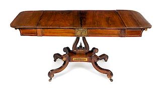 An American Classical Brass Inlaid Mahogany Drop-Leaf Table Height 27 x width 39 1/2 x depth 28 inches.