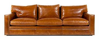 A Custom Leather-Upholstered Three-Seat Sofa Height 35 x width 108 x depth 40 inches.