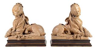 A Pair of French Terra Cotta Models of Sphinxes Height 24 x width 25 1/2 x depth 11 inches.