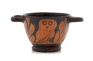 * An Apulian Red Figured Owl Skyphos Height 2 7/8 x width 5 7/8 inches.