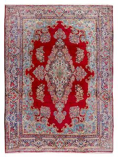 A Tabriz Wool Rug 15 feet 6 inches x 9 feet 10 1/2 inches.