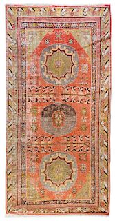 A Khotan Wool Rug 10 feet x 5 feet 2 inches.