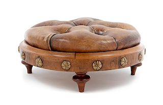 A Button Tufted Leather Upholstered Stool Height 5 1/2 x diameter 13 inches.
