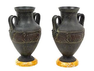 A Pair of Neoclassical Cast Metal Urns Height 15 3/4 inches.