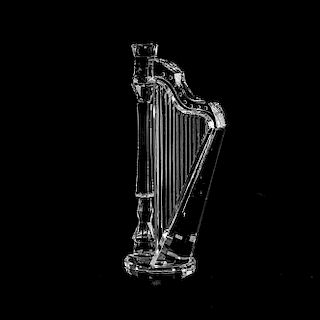 Arpa. Austria, siglo XX. Elaborado en cristal Swarovski. Marcado inferior. Con estuche. Detalles de conservación. 10 cm de altura.