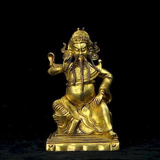 Chinese gilt bronze figure of an Immortal. 