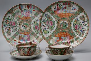 Group of Chinese rose medallion porcelain, includes two large plates and 2 cups and saucers.