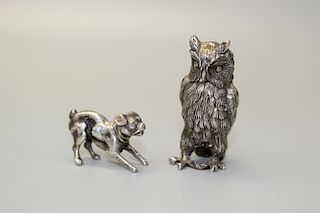 Two metal animal figurines.