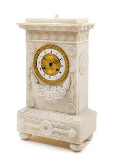 * A Charles X Carved Alabaster Mantel Clock Height 13 3/4 x width 7 3/4 x depth 4 1/2 inches.