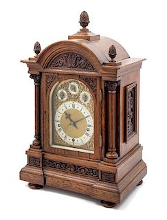 * A Black Forest Oak Bracket Clock Height 20 x width 14 3/4 x depth 10 inches.