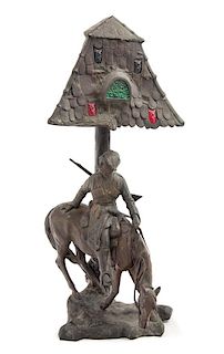 A German Cast Metal Figural Lamp Height 25 inches.