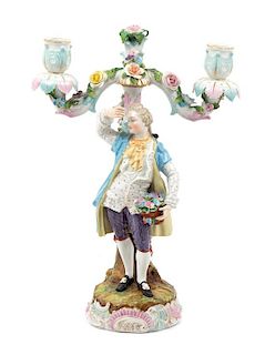 A Meissen Porcelain Figural Two-Light Candelabrum Height 13 1/2 inches.