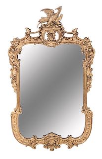 A Continental Giltwood Mirror Height 50 x width 29 1/2 inches.