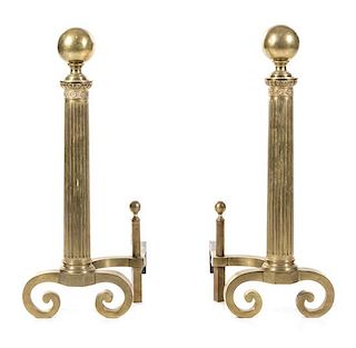 A Pair of Brass Andirons Height 32 x width 26 inches.