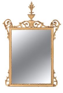 An Italian Giltwood Mirror Height 46 1/2 x width 32 inches.