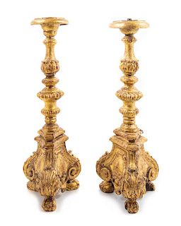 A Pair of Italian Giltwood Prickets Height 21 inches.