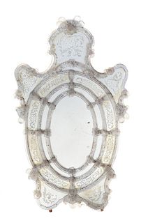 A Venetian Glass Mirror Height 48 inches.
