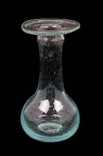 * A Roman Glass Unguentarium Height 4 1/2 inches.
