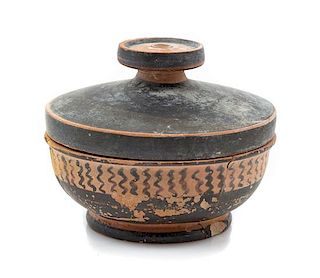 * A Greek Pottery Lidded Bowl Diameter 3 inches.