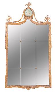 A George III Style Giltwood Mirror Height 57 x width 29 1/4 inches.