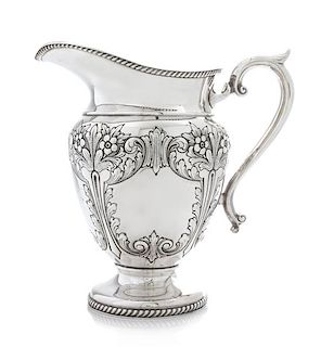An American Silver Water Pitcher, Durham Silver Co., New York, NY, Mid-20th Century, of baluster form with a gadroon neck and fo