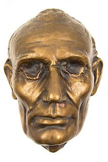 (LINCOLN, ABRAHAM) LIFE MASK. Gesso and bronze gilt plaster life mask, after the original by Leonard Volk.