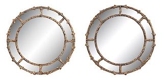A Pair of Whimsical Gilt Circular Mirrors Diameter 49 inches.