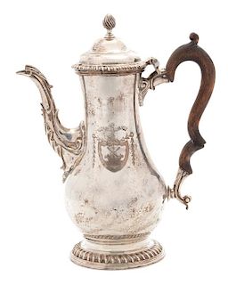 A George III Silver Coffee Pot, Benjamin Gignac, London, 1769, having an engraved armorial Steer Steady.