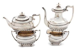 An English Silver Four-Piece Tea and Coffee Service, Walker & Hall, Sheffield, 1919, Comprising a coffee pot, teapot, open sugar