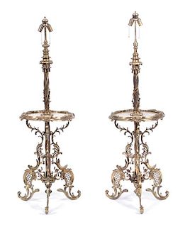 A Pair of Rococo Style Gilt Bronze and Onyx Lamp Tables Height 62 x diameter 19 inches.