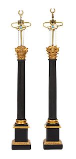 A Pair of Neoclasscial Style Ebonized and Gilt Metal Columnar Table Lamps Height 46 inches.