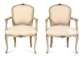 A Pair of Louis XV Style Carved and Painted Fauteuils Height 33 inches.