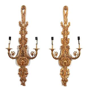 A Pair of Louis XVI Style Brass Two-Light Wall Sconces Height 39 inches.