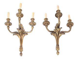 A Pair of Louis XVI Style Gilt Bronze Three-light Wall Sconces Height 19 x width 16 inches.